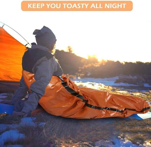 Extra-thick Mylar waterproof and windproof sleeping bag for emergencies, mountain hiking, camping, and survival. Increases body temperature up to 20°C.