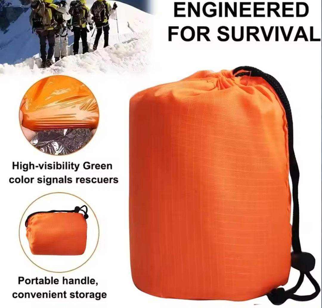 Extra-thick Mylar waterproof and windproof sleeping bag for emergencies, mountain hiking, camping, and survival. Increases body temperature up to 20°C.